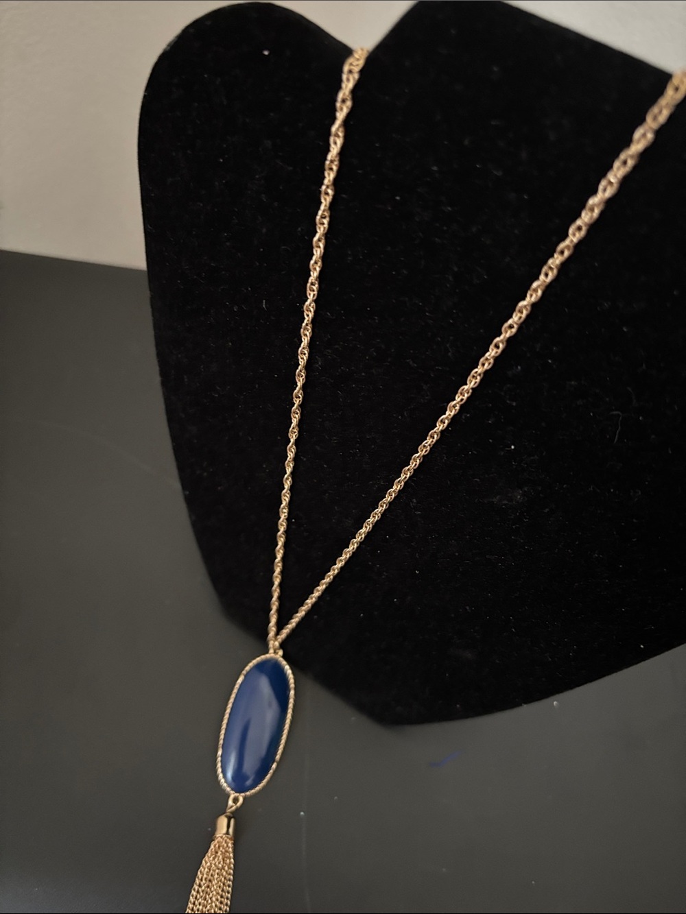 Gold-Tone Necklace with Blue Oval Pendant and Tassel